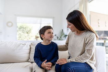 child being encouraged by mom