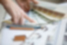 Creative people workplace. Close-up view of hands of young designer woman working with col