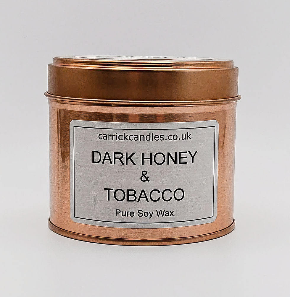 Dark Honey and Tobacco soy wax candle in a rose gold tin