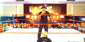 Spectator enters wrestling ring during Wrestlelution II.