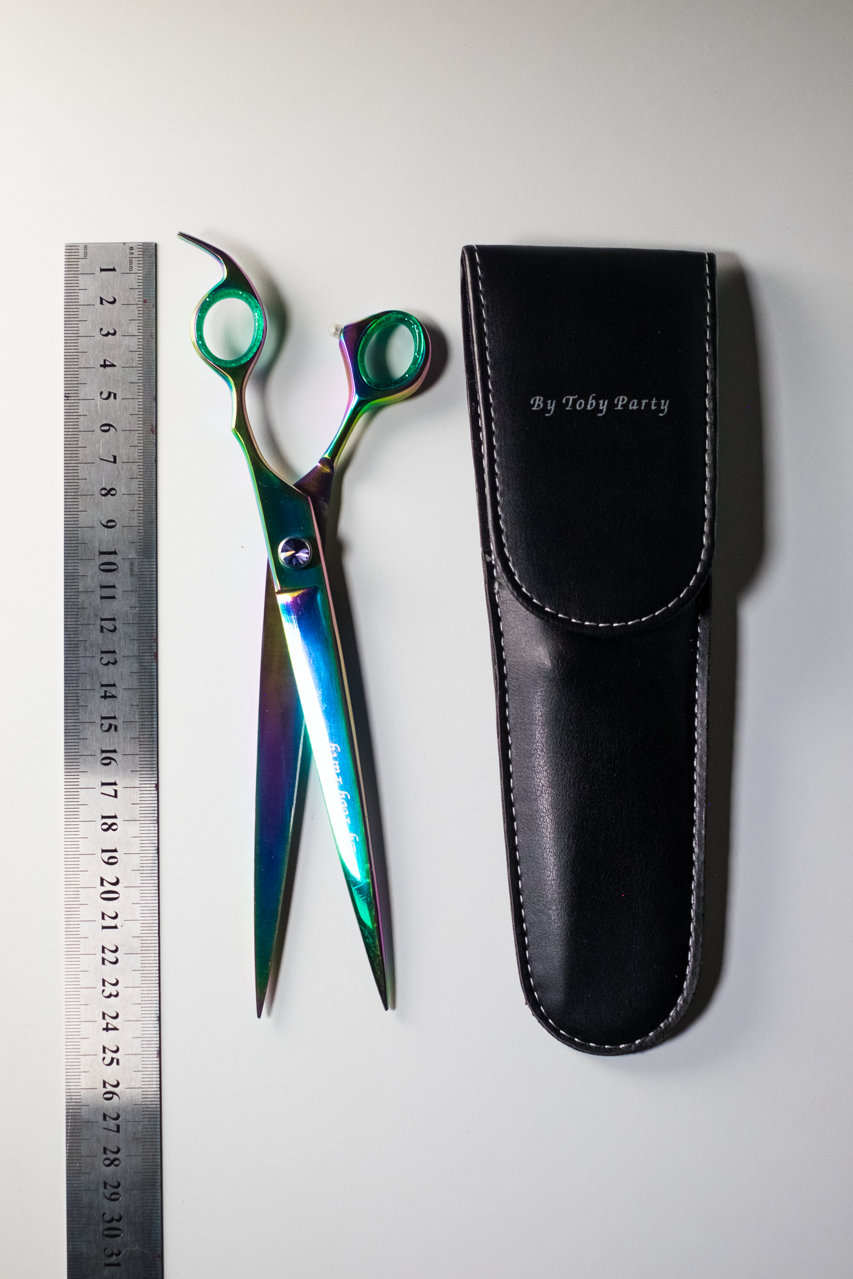 13. Forbice microdentata dritta