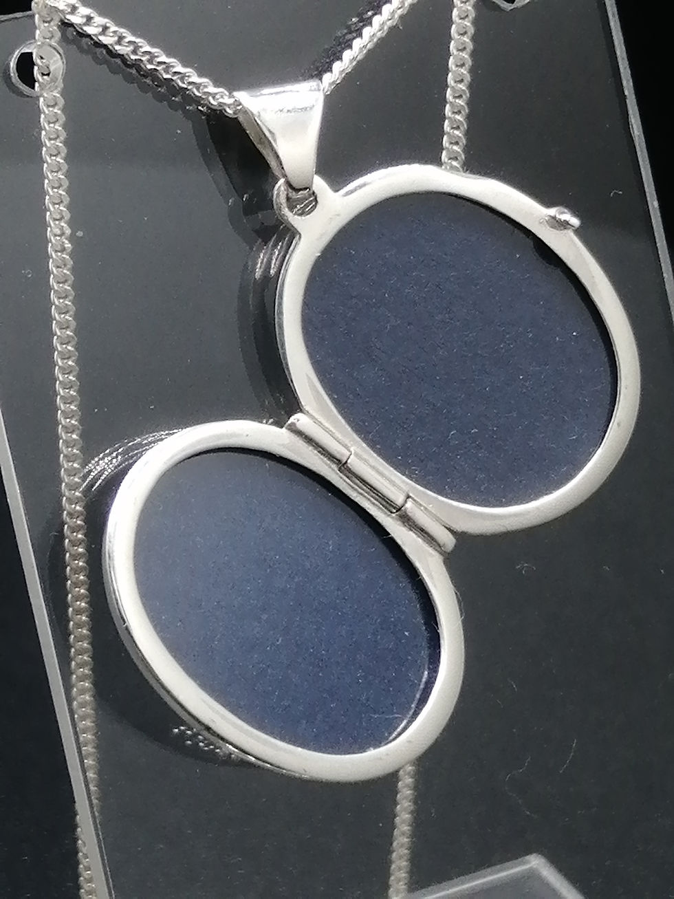 Thumbnail: 925 Silver Floral Engraved Garnet Centre Oval Locket