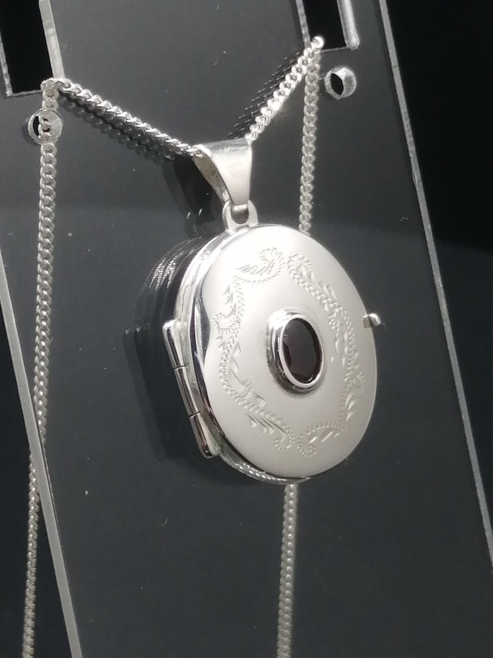 Thumbnail: 925 Silver Floral Engraved Garnet Centre Oval Locket