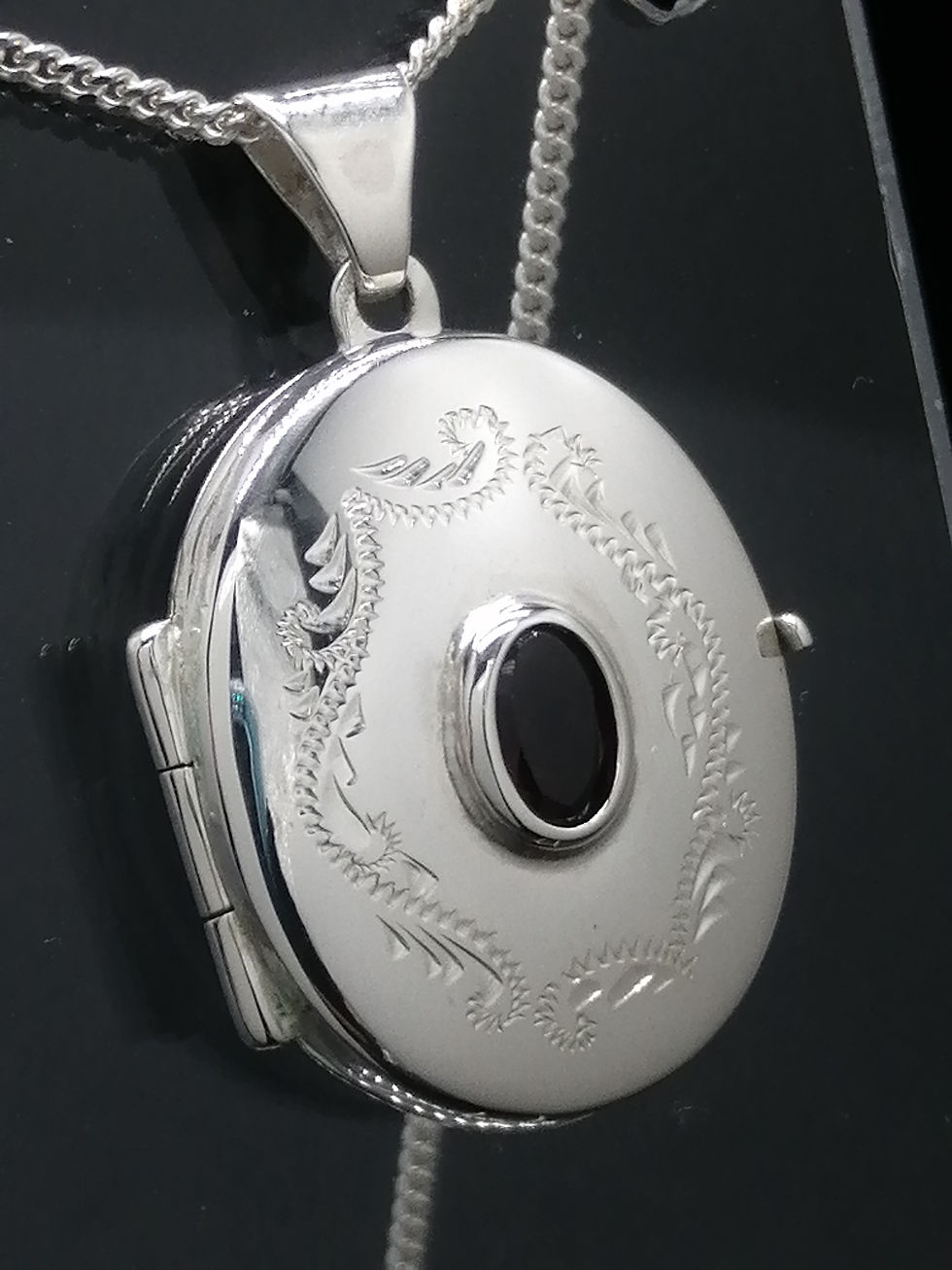 Thumbnail: 925 Silver Floral Engraved Garnet Centre Oval Locket