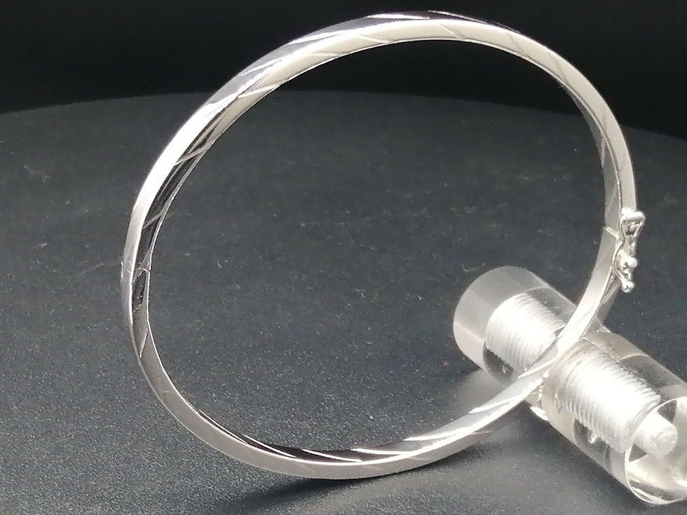 Thumbnail: 9ct White Gold Flat Cable Twist Bangle