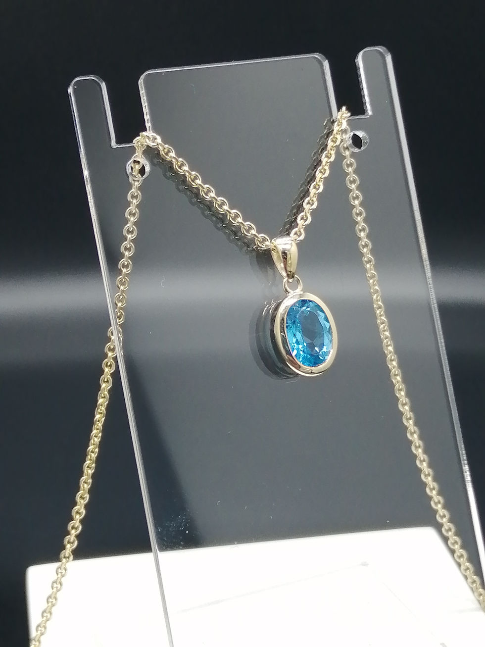 Thumbnail: 9ct Gold Blue Topaz Oval Pendant