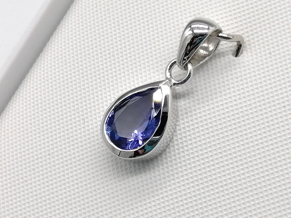 Thumbnail: 9ct White Gold Tanzanite Tear Drop Rub Over Pendant
