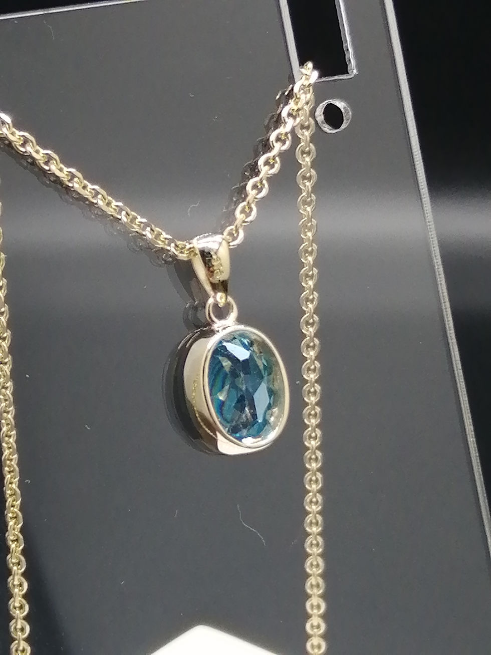 Thumbnail: 9ct Gold Blue Topaz Oval Pendant