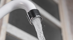 white-kitchen-sink-faucet-close-up.jpg