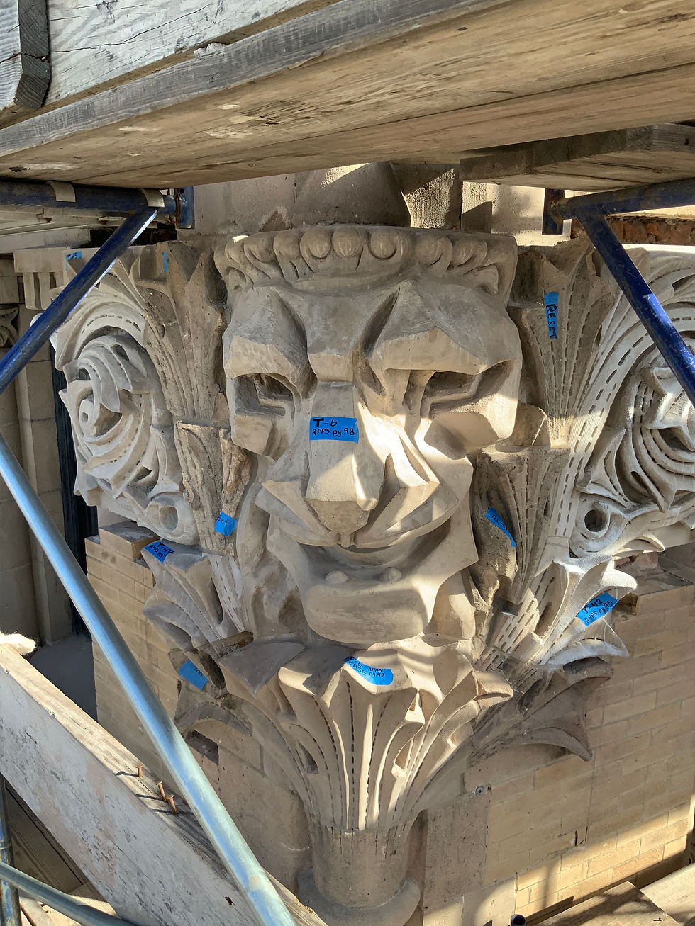 874 Broadway terra cota lion's head replacement. Replica stone fabricated in GFRC, as illustrated above.