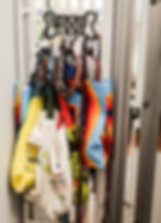 Dog leashes and bags at a Starkville boarding facility.