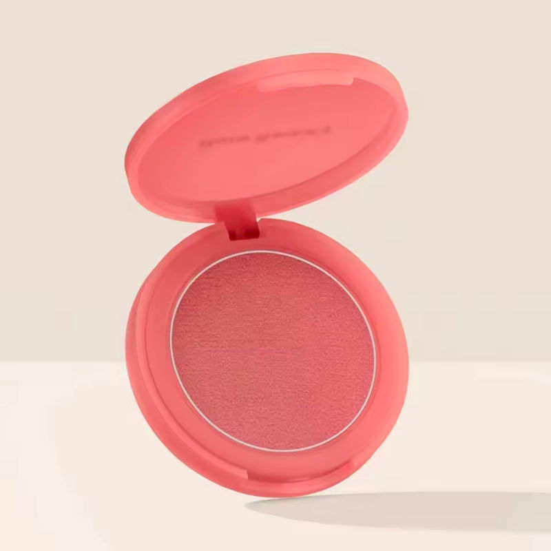 Thumbnail: Open coral-pink blush compact