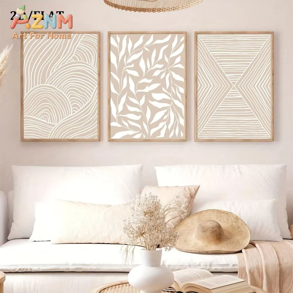 Three neutral abstract art prints above a sofa