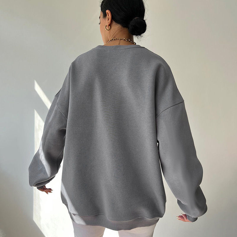 Thumbnail: Back of person wearing grey oversized sweatshirt