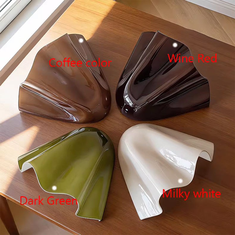 Thumbnail: Abstract wavy sculptures in coffee, wine red, dark green, milky white