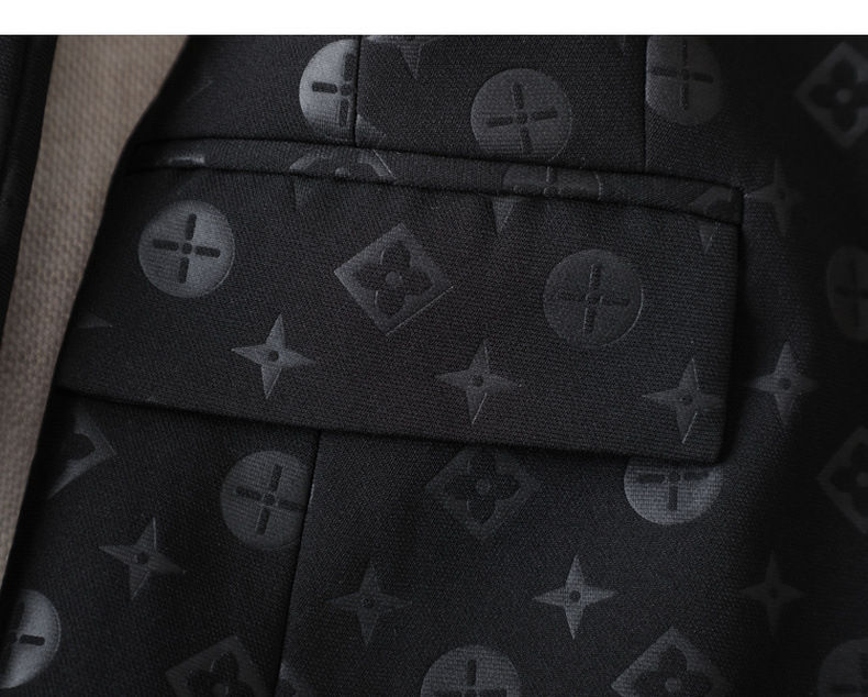 Thumbnail: Black suit fabric with subtle geometric pattern and pocket