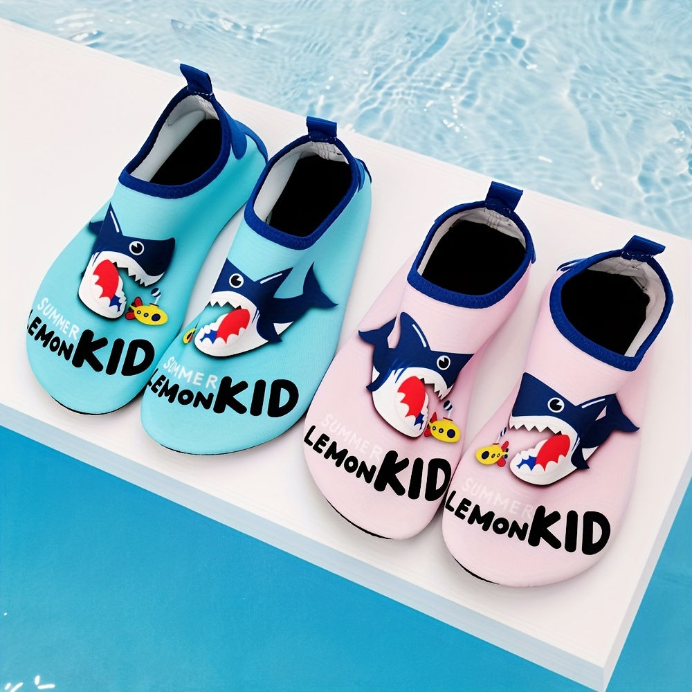 Two pairs of kids' water shoes, blue and pink, with shark design and 'LEMON KID' text.