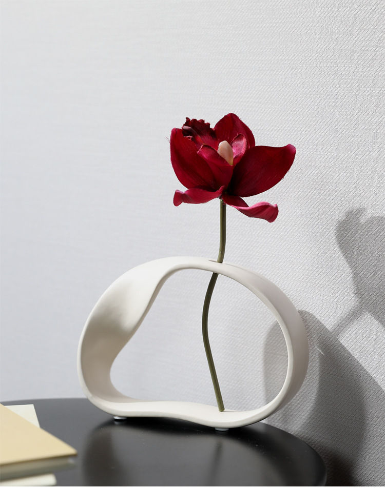 Thumbnail: Modern white ceramic vase with red flower