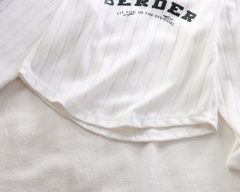 Thumbnail: White ribbed fabric, partial text 'ERDER FIT FOR IN THE ORIGINAL'