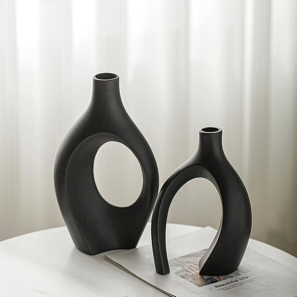 Thumbnail: Two modern black matte vases with abstract cutouts