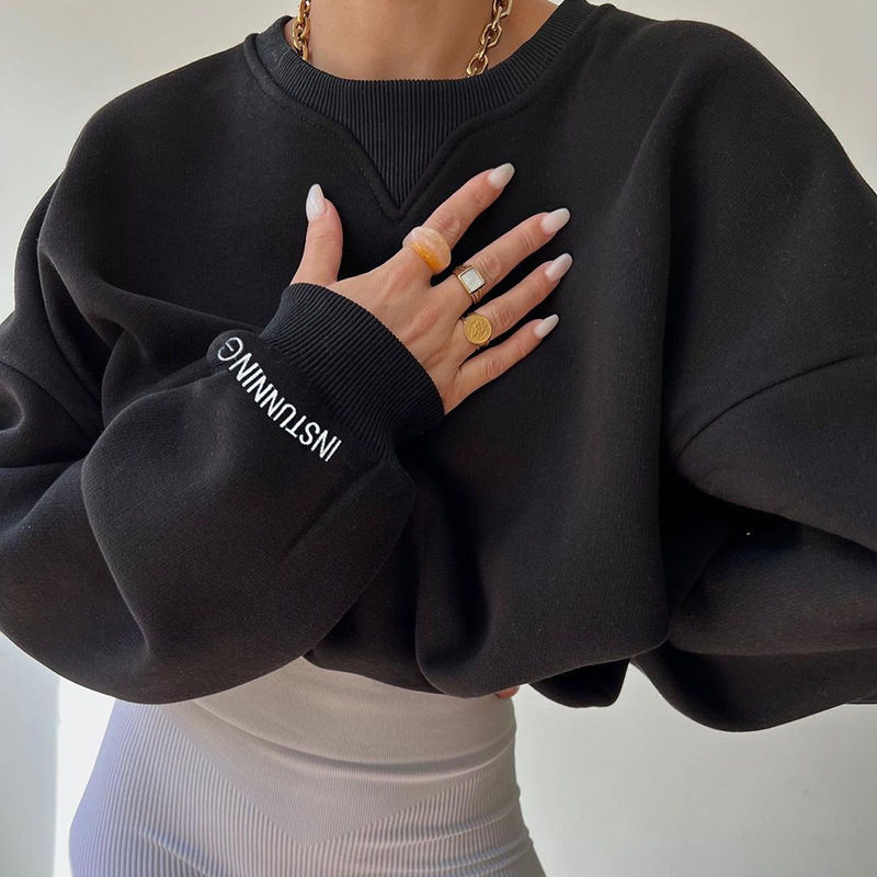 Thumbnail: Black cropped sweatshirt, 'INSTUNING' on sleeve