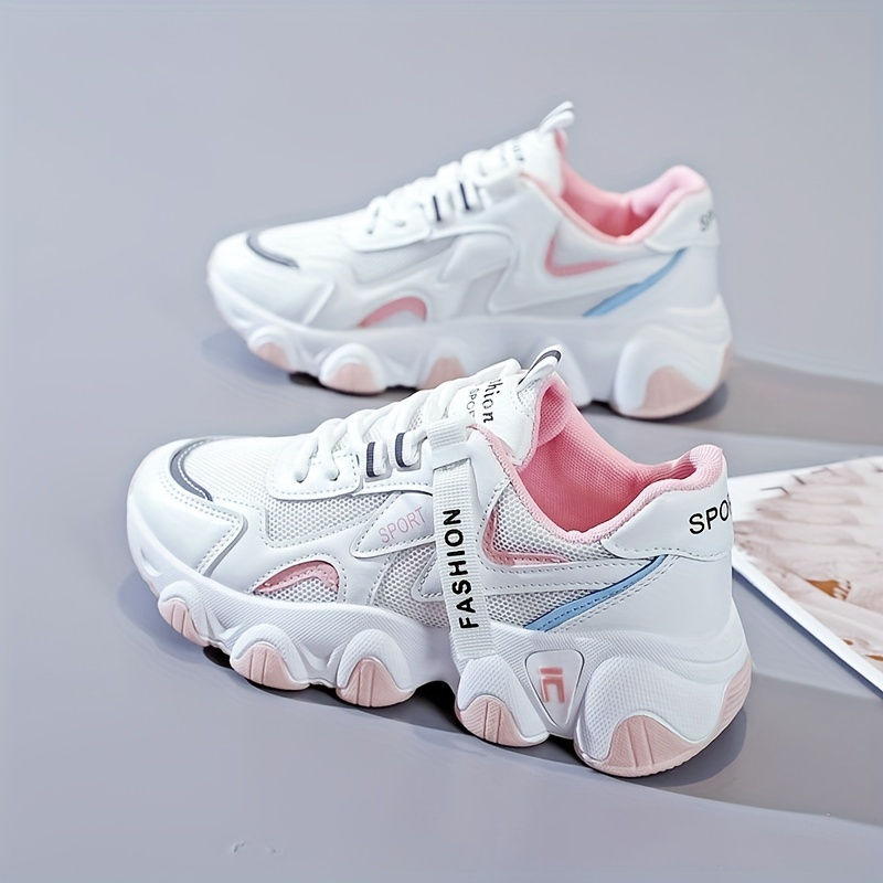 Thumbnail: White sneakers with pink and blue accents and chunky soles