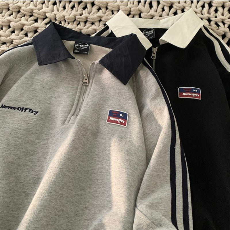 Two oversized sweatshirts: grey 'NeverOff Try' and black