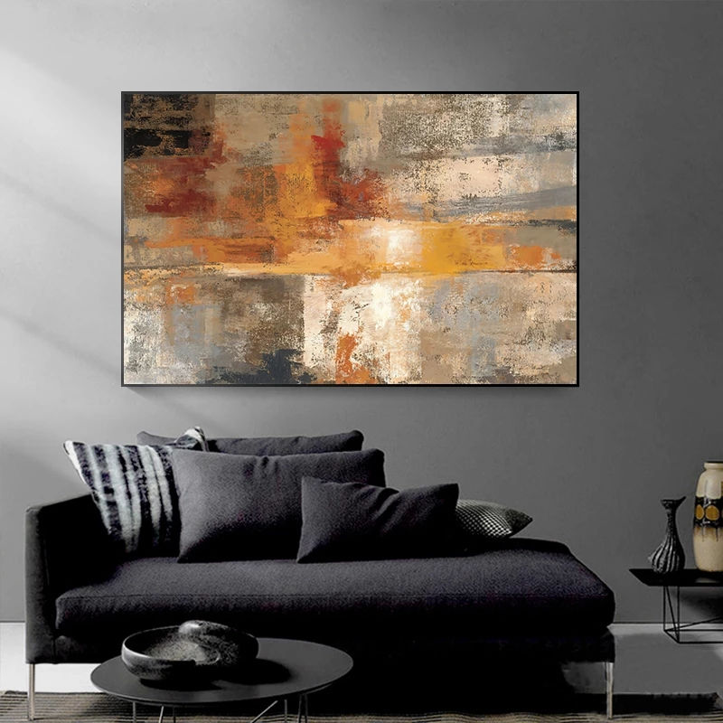 Thumbnail: Abstract art above a modern black sofa in a living room