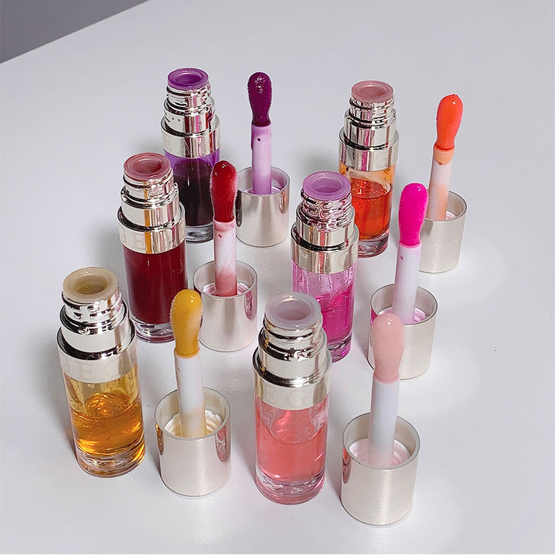 Thumbnail: Assorted colorful lip gloss bottles with applicators