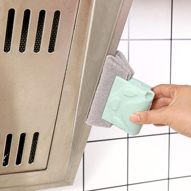 Thumbnail: Hand cleaning kitchen range hood with a groove cleaning cloth