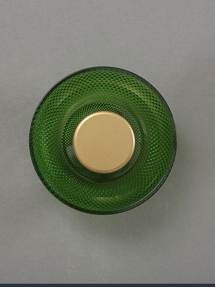 Thumbnail: Green textured glass object with gold center