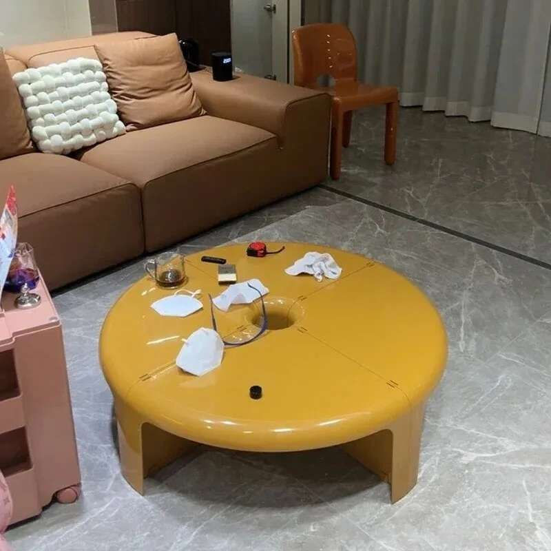 Thumbnail: Yellow round coffee table in a living room