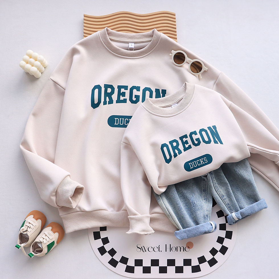 Thumbnail: Matching 'Oregon Ducks' sweatshirts, adult and child