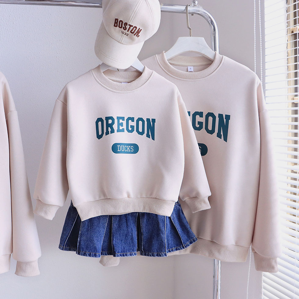 Thumbnail: Cream sweatshirt with OREGON text, denim skirt, and BOSTON cap