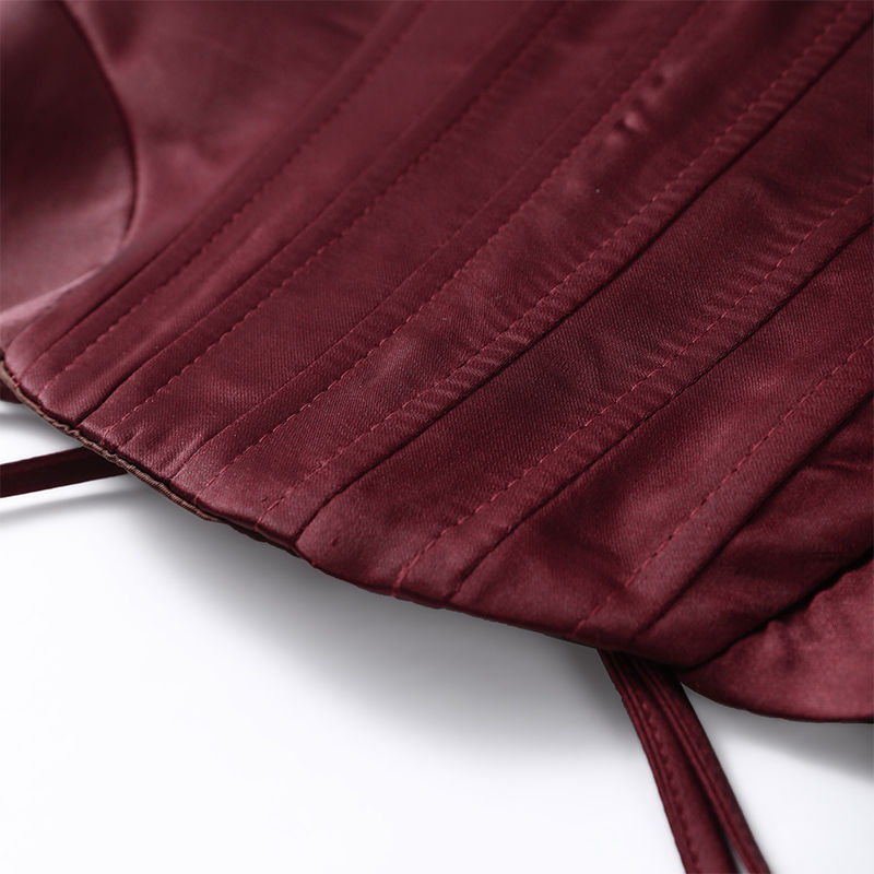 Thumbnail: Maroon satin fabric with structured seams