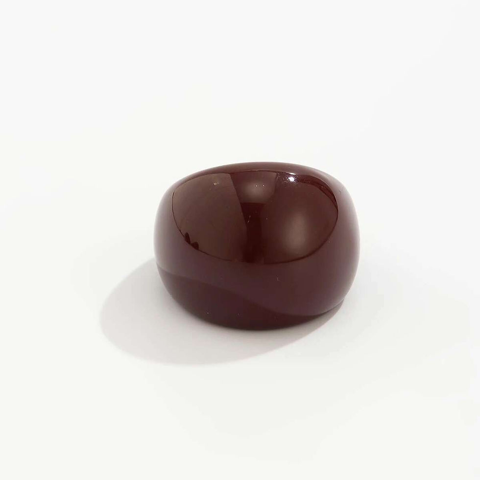 Thumbnail: Polished dark red, rounded object