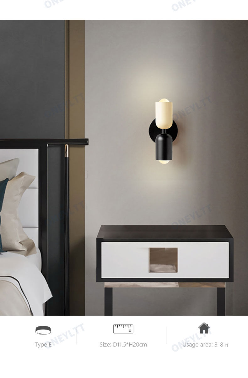 Thumbnail: Modern black and white wall sconce above a nightstand in a bedroom