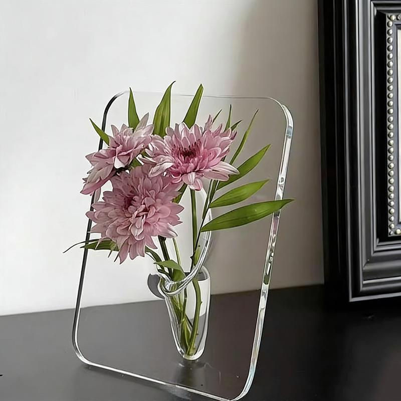 Thumbnail: Clear acrylic frame flower vase with pink blooms.