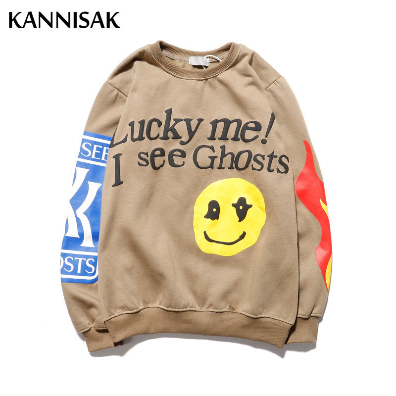 Thumbnail: Tan fleece sweatshirt with 'Lucky me! I see Ghosts' text and smiley face
