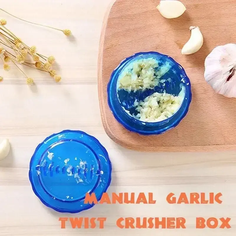 Thumbnail: Manual garlic twist crusher box with minced garlic and cloves