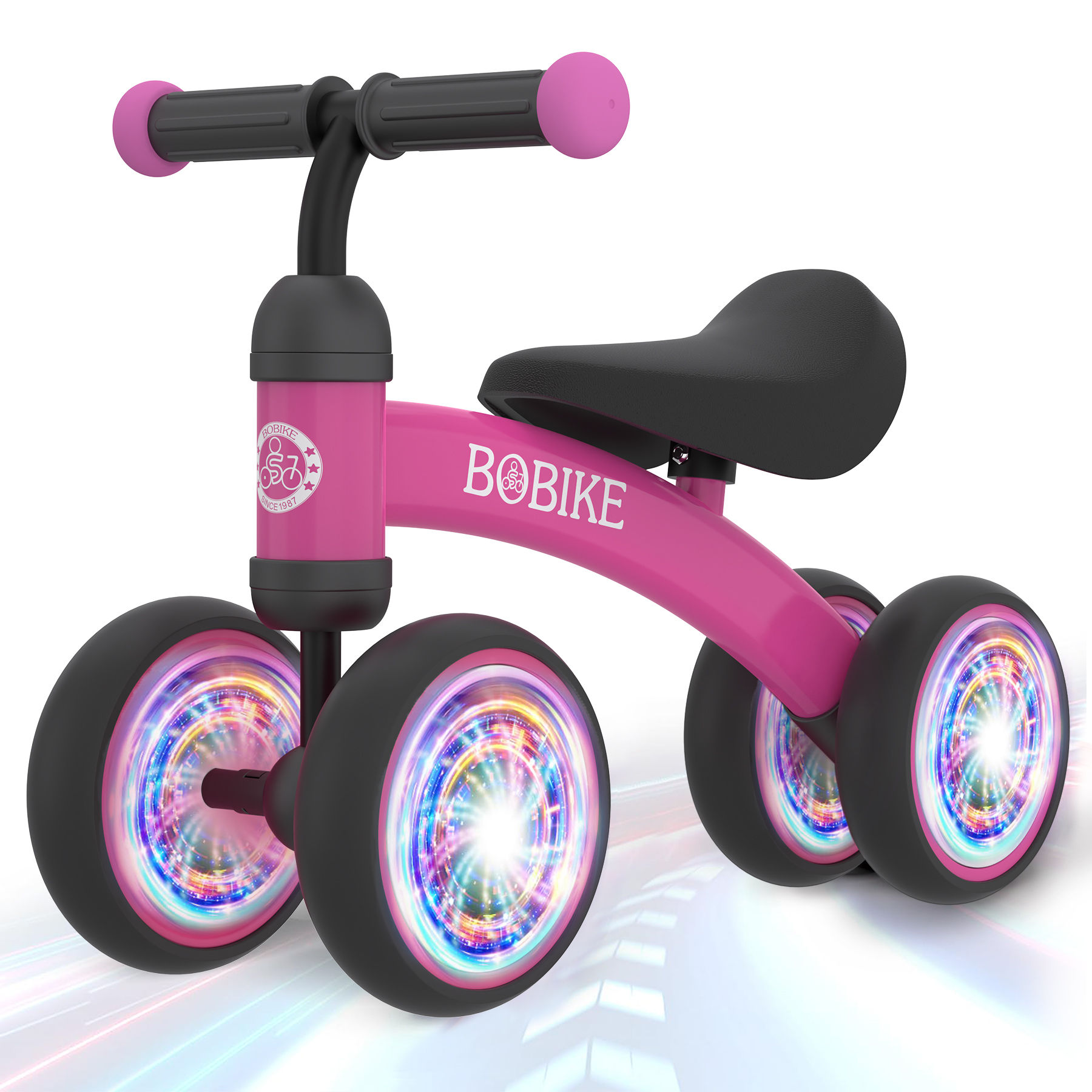 Pink Bobike balance bike with colorful light-up wheels
