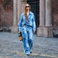 Thumbnail: Woman in patchwork denim shirt and wide-leg jeans