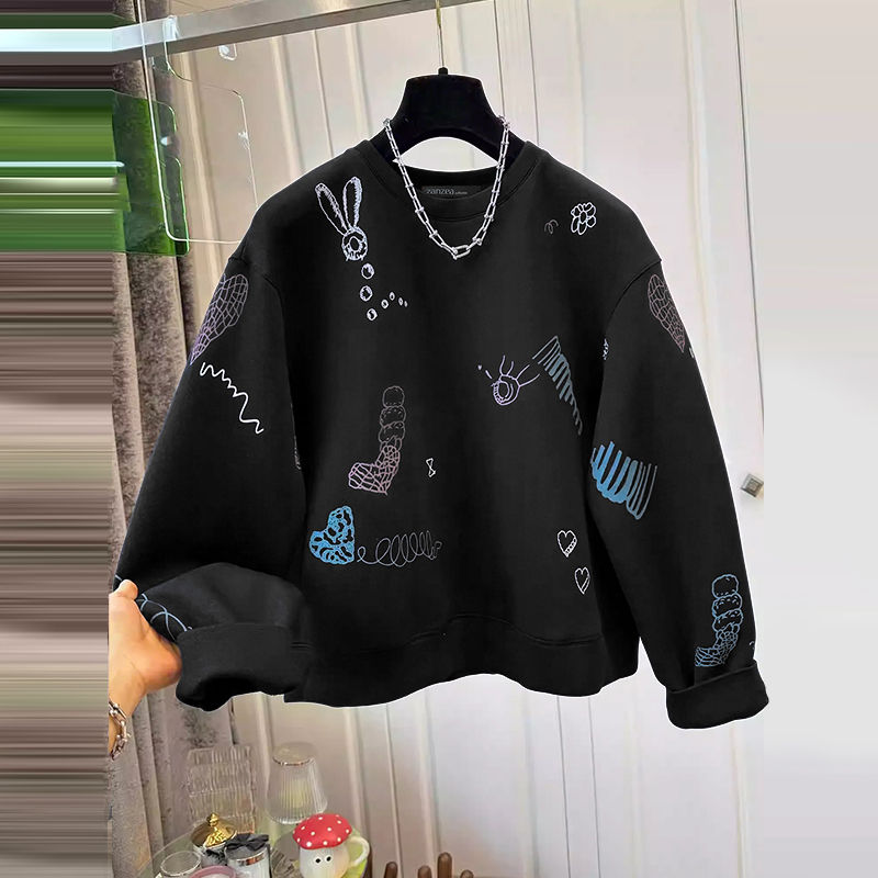 Thumbnail: Black sweatshirt with vibrant doodle art