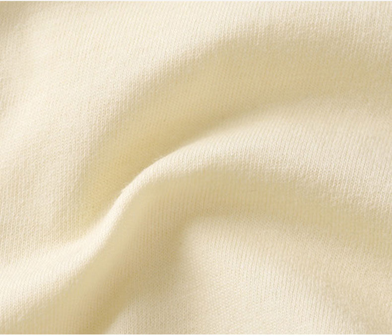 Thumbnail: Soft cream fabric with gentle folds