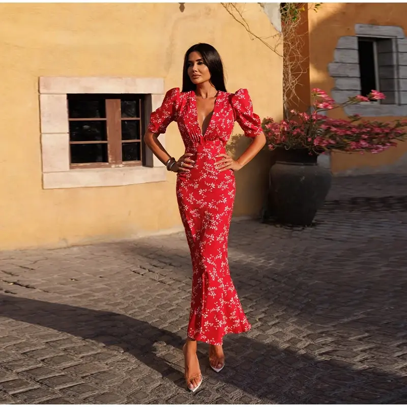 Thumbnail: Woman in red floral puff-sleeve midi dress