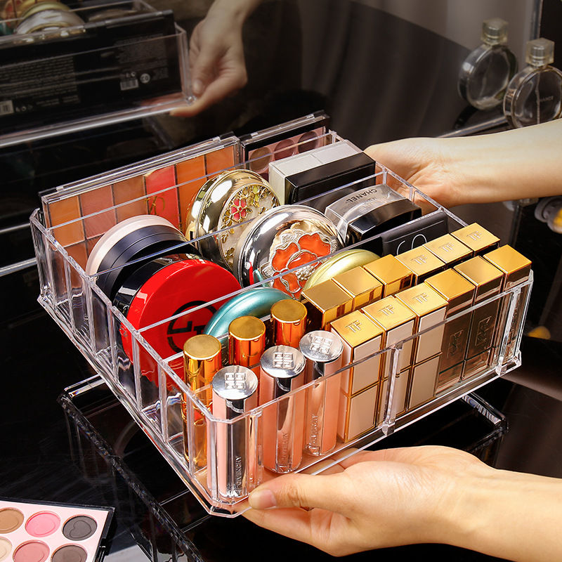 Clear acrylic makeup organizer with cosmetics