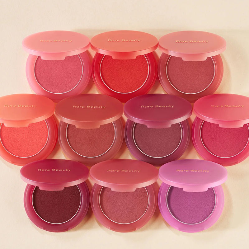 Nine open compact blushes in shades of pink and red