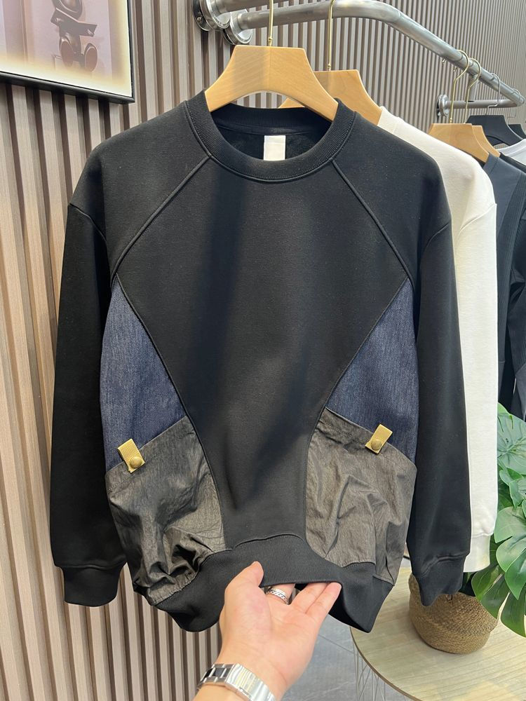 Thumbnail: Black sweatshirt with blue diagonal patches and front pockets
