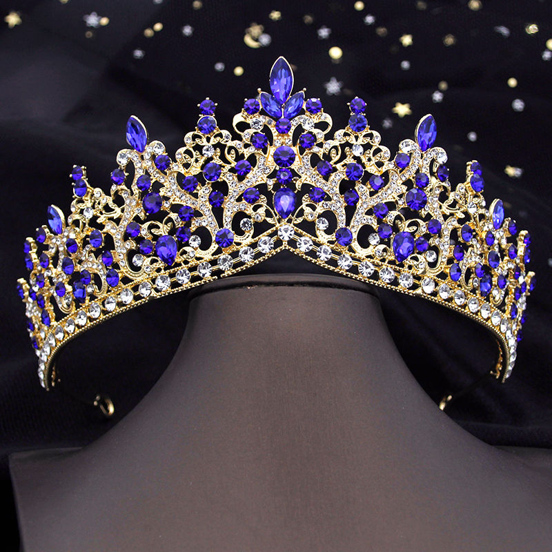 Thumbnail: Golden crown with blue and clear crystal jewels