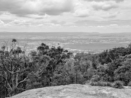 Black and white panoramic view over Tenterfield in regional NSW, representing rural communities seeking government grant funding and sustainable regional development.